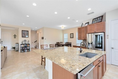 This beautifully maintained Jones Homes residence in the gated on Eagle Creek Golf Club in Florida - for sale on GolfHomes.com, golf home, golf lot