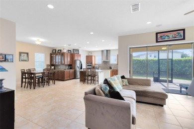 This beautifully maintained Jones Homes residence in the gated on Eagle Creek Golf Club in Florida - for sale on GolfHomes.com, golf home, golf lot