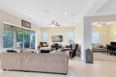 This beautifully maintained Jones Homes residence in the gated on Eagle Creek Golf Club in Florida - for sale on GolfHomes.com, golf home, golf lot