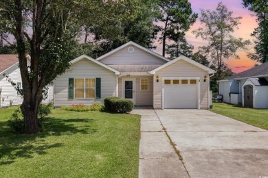 Experience the tranquility of this peaceful abode, situated at on Heron Point Golf Club in South Carolina - for sale on GolfHomes.com, golf home, golf lot