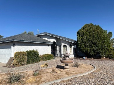 Corner lot property offering a side gate for rear access. Well on Cerbat Cliffs Golf Course in Arizona - for sale on GolfHomes.com, golf home, golf lot