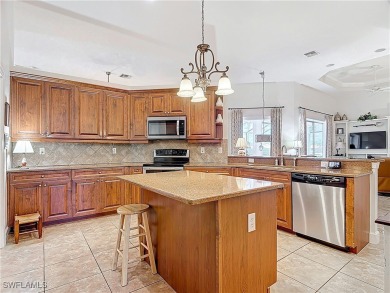 Enjoy Lakeside Luxury and Resort-Style Living!  Enjoy the on The Plantation Golf and Country Club in Florida - for sale on GolfHomes.com, golf home, golf lot