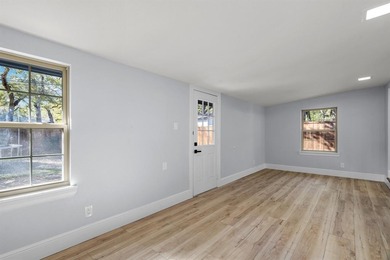 Experience refined living with golf-course views and a on Meadowbrook Golf Course in Texas - for sale on GolfHomes.com, golf home, golf lot