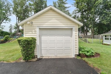 This cozy 2-bedroom, 1.5 bath home has so much to offer! Located on En-Joie Golf Course in New York - for sale on GolfHomes.com, golf home, golf lot