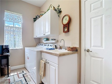Enjoy Lakeside Luxury and Resort-Style Living!  Enjoy the on The Plantation Golf and Country Club in Florida - for sale on GolfHomes.com, golf home, golf lot