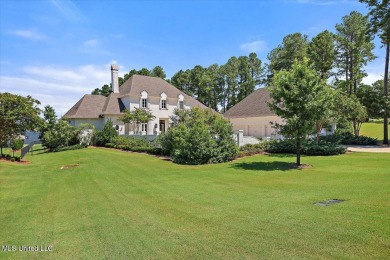 Discover resort-style living just minutes away from the on Reunion Golf Club in Mississippi - for sale on GolfHomes.com, golf home, golf lot