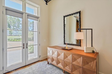 Discover resort-style living just minutes away from the on Reunion Golf Club in Mississippi - for sale on GolfHomes.com, golf home, golf lot