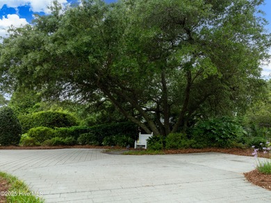 Tucked away at the end of a quiet cul-de-sac, this beautiful on Porters Neck Country Club in North Carolina - for sale on GolfHomes.com, golf home, golf lot