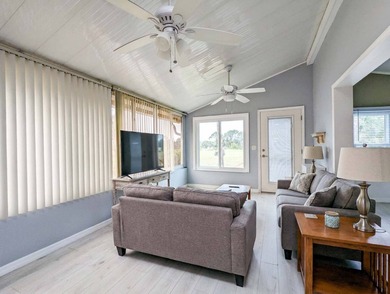 This unfurnished 2BR/1.5b park home is located on a quiet street on The Great Outdoors Golf and Country Club in Florida - for sale on GolfHomes.com, golf home, golf lot