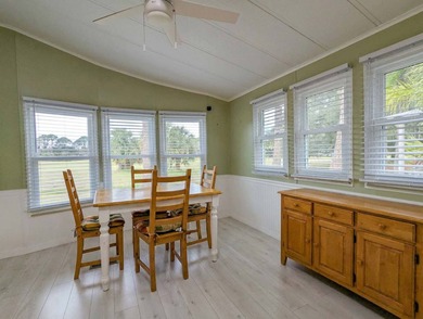 This unfurnished 2BR/1.5b park home is located on a quiet street on The Great Outdoors Golf and Country Club in Florida - for sale on GolfHomes.com, golf home, golf lot