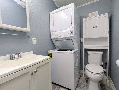 This unfurnished 2BR/1.5b park home is located on a quiet street on The Great Outdoors Golf and Country Club in Florida - for sale on GolfHomes.com, golf home, golf lot