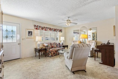 Located in the desirable  SPRUCE CREEK SOUTH adjacent to THE on The Links of Spruce Creek in Florida - for sale on GolfHomes.com, golf home, golf lot