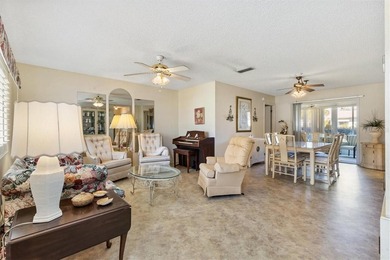 Located in the desirable  SPRUCE CREEK SOUTH adjacent to THE on The Links of Spruce Creek in Florida - for sale on GolfHomes.com, golf home, golf lot