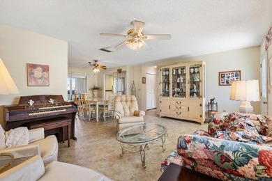 Located in the desirable  SPRUCE CREEK SOUTH adjacent to THE on The Links of Spruce Creek in Florida - for sale on GolfHomes.com, golf home, golf lot