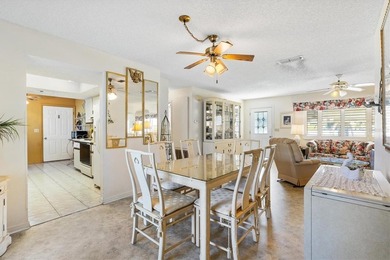 Located in the desirable  SPRUCE CREEK SOUTH adjacent to THE on The Links of Spruce Creek in Florida - for sale on GolfHomes.com, golf home, golf lot