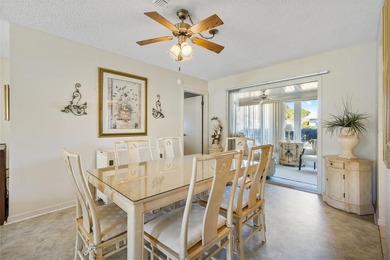 Located in the desirable  SPRUCE CREEK SOUTH adjacent to THE on The Links of Spruce Creek in Florida - for sale on GolfHomes.com, golf home, golf lot