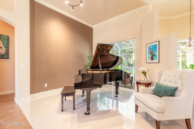 Experience refined living in this move-in ready golf course home on Halifax Plantation Golf Club in Florida - for sale on GolfHomes.com, golf home, golf lot