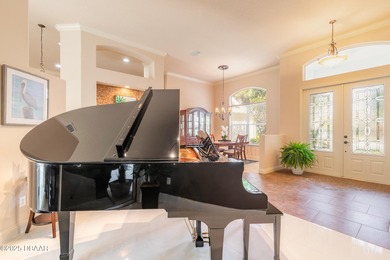 Experience refined living in this move-in ready golf course home on Halifax Plantation Golf Club in Florida - for sale on GolfHomes.com, golf home, golf lot