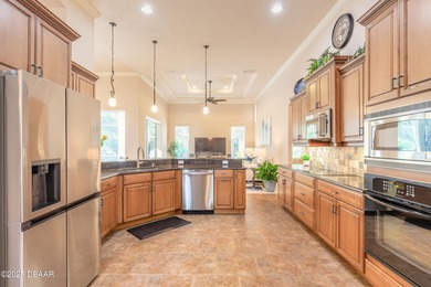Experience refined living in this move-in ready golf course home on Halifax Plantation Golf Club in Florida - for sale on GolfHomes.com, golf home, golf lot