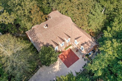 Pull into your private stone walled courtyard and immediately on Monticello Golf Club At Savannah Lakes in South Carolina - for sale on GolfHomes.com, golf home, golf lot