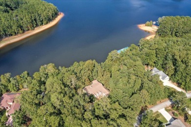 Pull into your private stone walled courtyard and immediately on Monticello Golf Club At Savannah Lakes in South Carolina - for sale on GolfHomes.com, golf home, golf lot