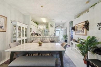 Welcome to this charming home nestled on a serene conservation on Scepter Golf Club in Florida - for sale on GolfHomes.com, golf home, golf lot