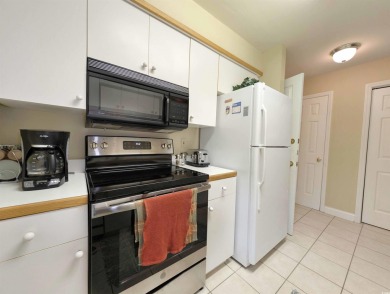 Well maintained and furnished, second floor end unit on Pawleys Plantation Golf and Country Club in South Carolina - for sale on GolfHomes.com, golf home, golf lot