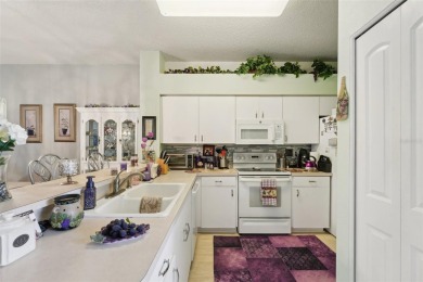 Welcome to this charming home nestled on a serene conservation on Scepter Golf Club in Florida - for sale on GolfHomes.com, golf home, golf lot