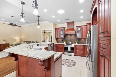Elegant Pool Home in Glen Eagle in Winter Springs. Situated on a on Tuscawilla Country Club in Florida - for sale on GolfHomes.com, golf home, golf lot