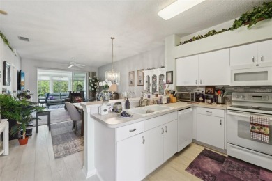 Welcome to this charming home nestled on a serene conservation on Scepter Golf Club in Florida - for sale on GolfHomes.com, golf home, golf lot
