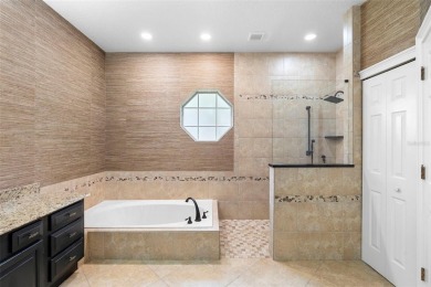 Elegant Pool Home in Glen Eagle in Winter Springs. Situated on a on Tuscawilla Country Club in Florida - for sale on GolfHomes.com, golf home, golf lot