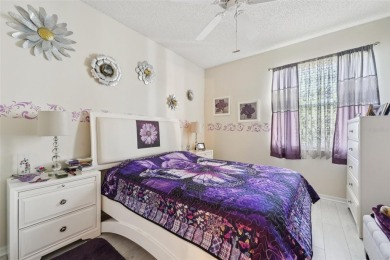 Welcome to this charming home nestled on a serene conservation on Scepter Golf Club in Florida - for sale on GolfHomes.com, golf home, golf lot