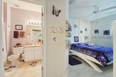 Welcome to this charming home nestled on a serene conservation on Scepter Golf Club in Florida - for sale on GolfHomes.com, golf home, golf lot