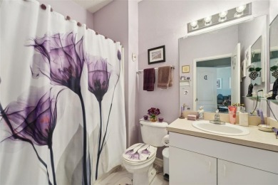 Welcome to this charming home nestled on a serene conservation on Scepter Golf Club in Florida - for sale on GolfHomes.com, golf home, golf lot