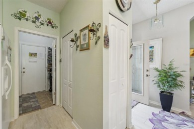 Welcome to this charming home nestled on a serene conservation on Scepter Golf Club in Florida - for sale on GolfHomes.com, golf home, golf lot