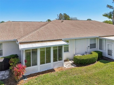 Welcome to this charming home nestled on a serene conservation on Scepter Golf Club in Florida - for sale on GolfHomes.com, golf home, golf lot