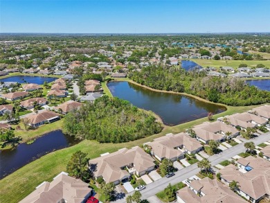 Welcome to this charming home nestled on a serene conservation on Scepter Golf Club in Florida - for sale on GolfHomes.com, golf home, golf lot