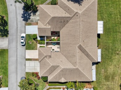 Welcome to this charming home nestled on a serene conservation on Scepter Golf Club in Florida - for sale on GolfHomes.com, golf home, golf lot