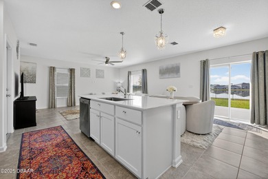 Discover your new light, bright, and delightfully modern on LPGA International Golf Course in Florida - for sale on GolfHomes.com, golf home, golf lot