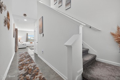 Discover your new light, bright, and delightfully modern on LPGA International Golf Course in Florida - for sale on GolfHomes.com, golf home, golf lot