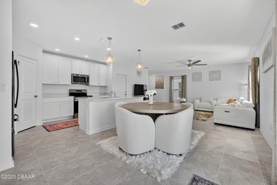 Discover your new light, bright, and delightfully modern on LPGA International Golf Course in Florida - for sale on GolfHomes.com, golf home, golf lot