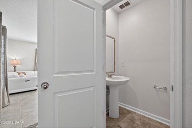 Discover your new light, bright, and delightfully modern on LPGA International Golf Course in Florida - for sale on GolfHomes.com, golf home, golf lot