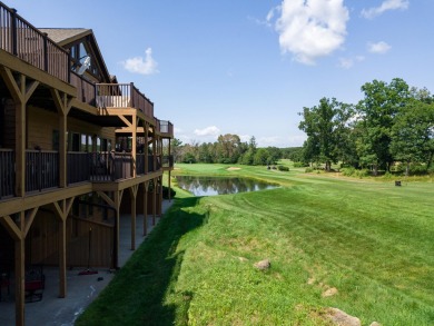 Stunning Furnished Condo on Castle Rock Lake! Discover luxury on Northern Bay Golf Resort and Marina in Wisconsin - for sale on GolfHomes.com, golf home, golf lot