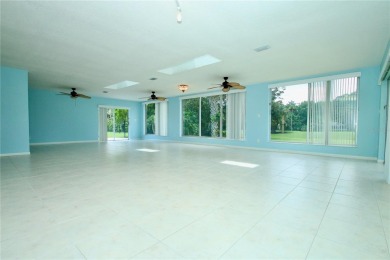 Rarely do houses like this come up for sale to own a stylish on Palm Harbor Golf Club in Florida - for sale on GolfHomes.com, golf home, golf lot