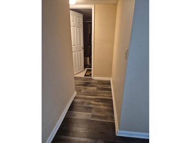 Enjoy the Florida lifestyle in this charming first-floor condo on  in Florida - for sale on GolfHomes.com, golf home, golf lot