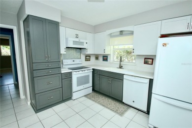 Rarely do houses like this come up for sale to own a stylish on Palm Harbor Golf Club in Florida - for sale on GolfHomes.com, golf home, golf lot