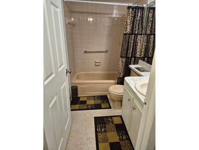 Enjoy the Florida lifestyle in this charming first-floor condo on  in Florida - for sale on GolfHomes.com, golf home, golf lot