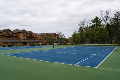 Stunning Furnished Condo on Castle Rock Lake! Discover luxury on Northern Bay Golf Resort and Marina in Wisconsin - for sale on GolfHomes.com, golf home, golf lot