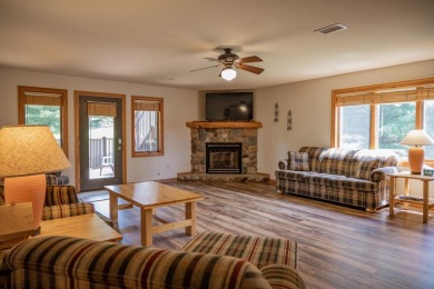 Stunning Furnished Condo on Castle Rock Lake! Discover luxury on Northern Bay Golf Resort and Marina in Wisconsin - for sale on GolfHomes.com, golf home, golf lot