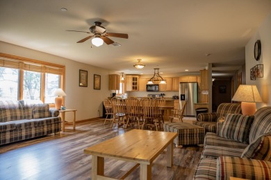 Stunning Furnished Condo on Castle Rock Lake! Discover luxury on Northern Bay Golf Resort and Marina in Wisconsin - for sale on GolfHomes.com, golf home, golf lot